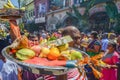 Devotees make their offering for lord Murugan in silver chariot in front Sri Kamatchi Amman Temple. Royalty Free Stock Photo